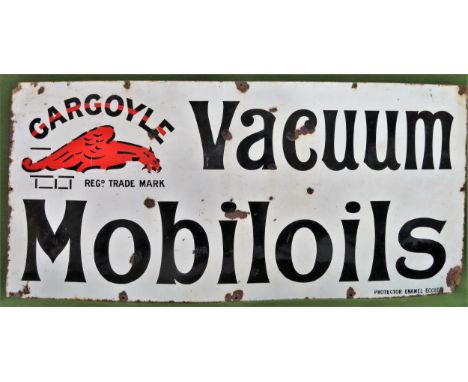 Gargoyle Vacuum Mobiloils vintage enamelled advertising sign. Approx. 61cms x 131cms

used condition with damage to enamel 