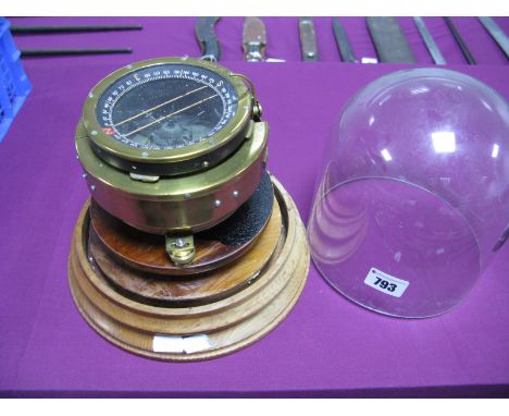 A WWII Period RAF Air Ministry Compass, brass housing, type P8 serial no 91852 H, mounted on a wooden base.