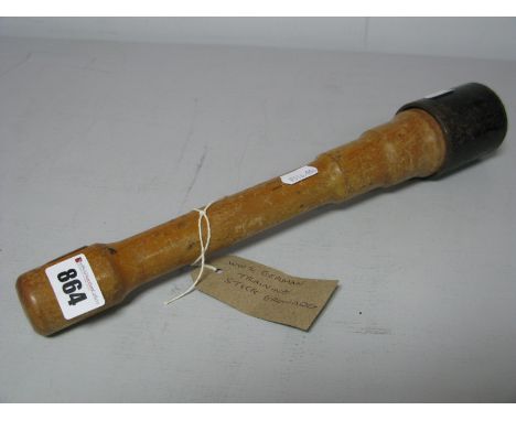 A WWII Era German Training Stick Grenade, 35cm long, turned wooden shaft with weighted end.