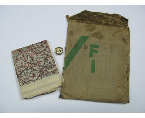 A WWII Escape Map and Compass, in cloth envelope. A map of mid and Southern France and Borders with Spain and Switzerland, pr