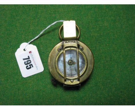 A WWII Era British Issue Marching Compass, by T.G. Co Ltd, MKIII, dated 1945 No. 313767 with W D Arrow.