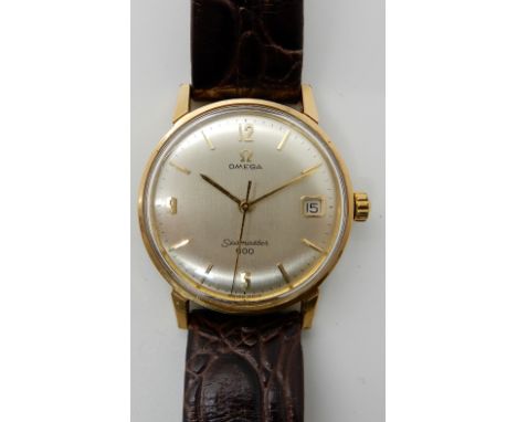 A GOLD CAPPED GENTS OMEGA SEAMASTER 600 WRISTWATCH a brushed cream coloured dial with gold coloured Arabic and baton numerals