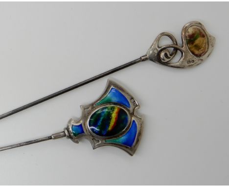 TWO SILVER AND ENAMEL ART NOUVEAU HATPINS enamelled in purple and green hallmarked for Birmingham 1907 and made by Gourdel Va