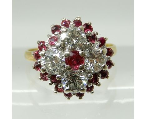 AN 18CT GOLD RUBY AND DIAMOND CLUSTER RING set with four brilliant cut diamonds with a total of estimated approx 1.20cts comb