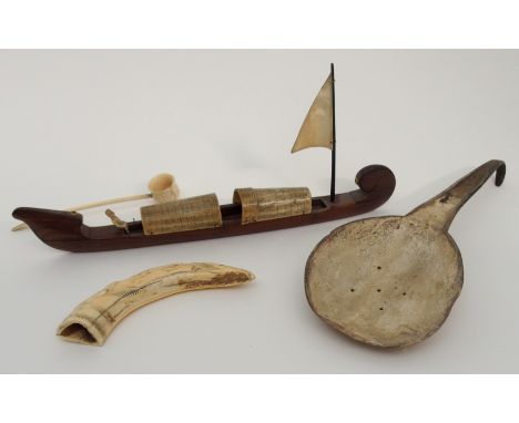 AN AFRICAN IVORY WALRUS TUSK decorated in relief with animals and fish, 18cm long, bone snuff measure, 18.5cm long, Lower Con
