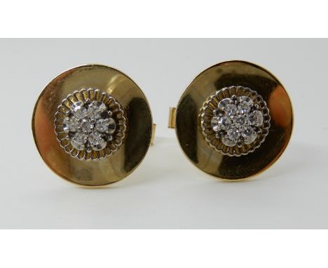 A PAIR OF 14KT DIAMOND SET CUFFLINKS set with a rondel of eight cut diamonds, estimated approx 0.14cts combined diameter of t