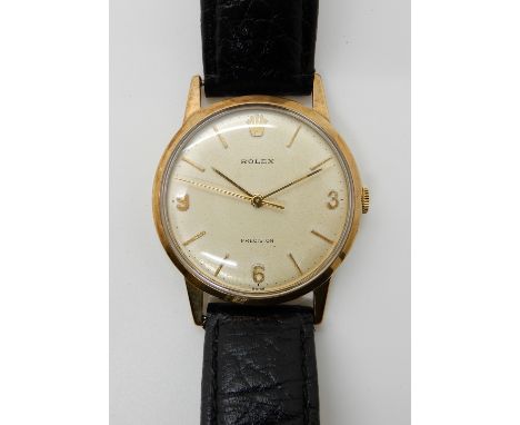 A 9CT GOLD GENTS ROLEX PRECISION WRISTWATCH with cream dial Arabic quarter numerals and further baton numerals, Rolex crown t