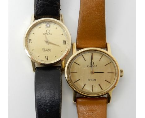 TWO OMEGA WATCHES a 14k gold Omega De Ville Quartz, diameter of case 2.2cm, weight including mechanism and black leather stra