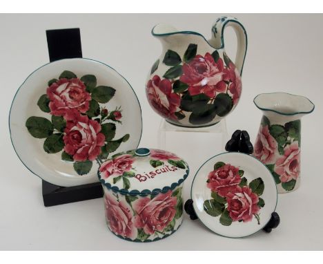 A COLLECTION OF WEMYSS WARE IN CABBAGE ROSE PATTERN comprising a biscuit pot and cover, 11cm high, a plate, 20cm diameter, a 