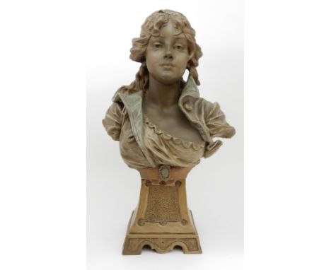 A GOLDSCHEIDER TERRACOTTA BUST OF A MAIDEN upon plinth, with plaque to back incised Goldscheider Wein, 71cm high Condition Re