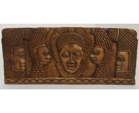 TWO BENIN CARVED OBA PLAQUES each with four figures surrounding the King and Queen, 32 x 77cm and 32 x 76cm, an African eboni