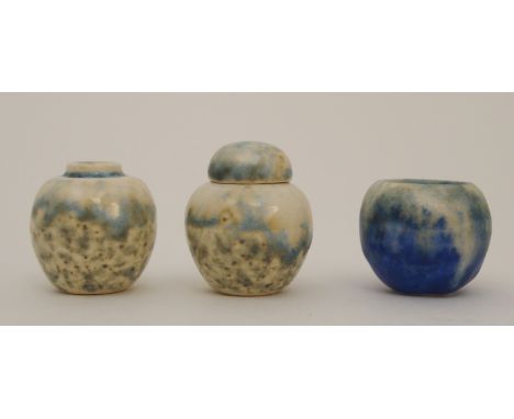 THREE MINIATURE RUSKIN POTTERY PIECES including a blue glazed bowl 2cm high, a crystalline glaze vase, 2.3cm high and a ginge