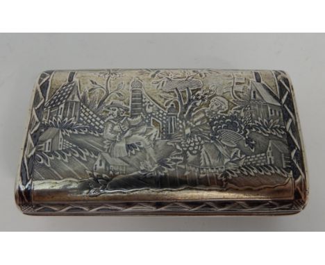 A RUSSIAN SILVER NIELLO SNUFF BOX possibly marked for Moscow &amp; 84, of rounded rectangular form, the niello on the hinged 