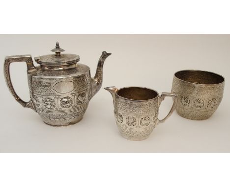 A VICTORIAN THREE PIECE SILVER TEA SERVICE maker's mark JR Glasgow 1886, of tapering cylindrical form with foliate engraved d