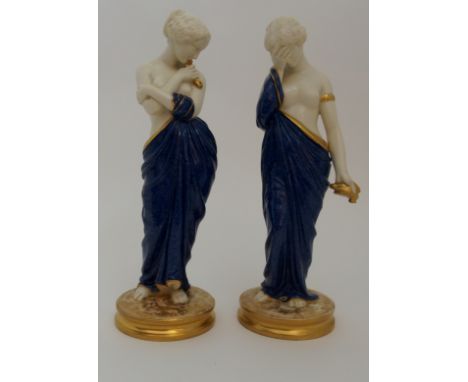 A PAIR OF ROYAL WORCESTER FIGURES JOY AND SORROW modelled by James Hadley, the blue robed maidens each with a gilded dove, im