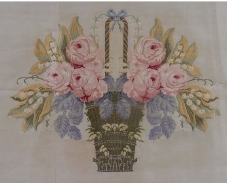 AN EARLY 20TH CENTURY PETIT POINT EMBROIDERY depicting roses and lily of the valley in a basket, 65cm x 50cm, another, an emb