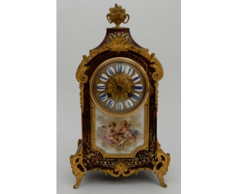 A FRENCH BOULE MANTLE CLOCK the faux tortoiseshell case with inlaid brass detail, the dial with enamelled Roman numeral marke