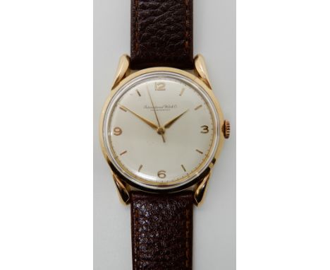 AN 18CT GOLD INTERNATIONAL WATCH CO SCHAFFHAUSEN WRISTWATCH tear drop lugs, cream dial with gold coloured baton, Arabic numer