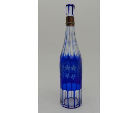 A 19TH CENTURY BLUE FLASHED AND CUT GLASS DECANTER with vine etched decoration, with silver collar, Hamilton and Inches, Edin