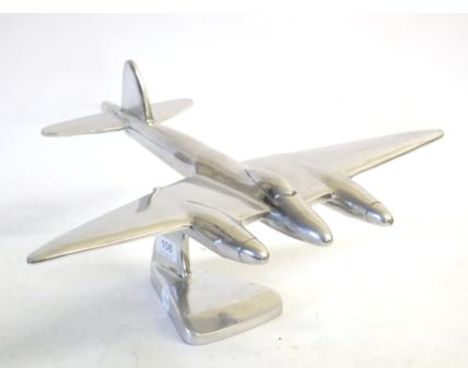 A Cast White Metal Model of a De Havilland Mosquito, on a shaped pillar and triangular base, 39 cm long, 24 cm highOverall co