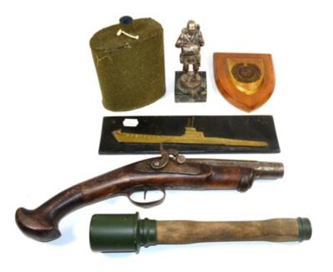 A Collection of Assorted Militaria, comprising a plated, white metal figure of a German Fallschirmjäger (Paratrooper), on a s