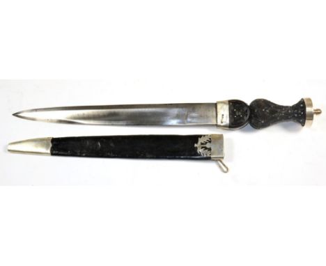 A 19th Century Scottish Dirk, the 33.5cm single edge fullered broad steel blade stamped ECSG at the ricasso, the silver colou