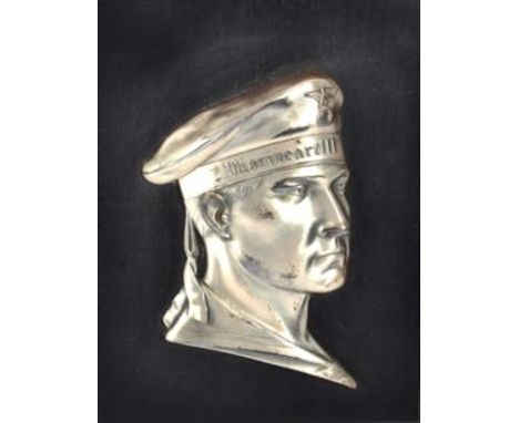 A German Third Reich Period White Metal Wall Plaque, depicting a profile head portrait of a naval rating in the uniform of th