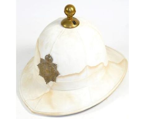 A Royal Marines Wolesley Pattern Bandsman's Helmet, with brass ball top, brass helmet plate with King's crown, the leather sw
