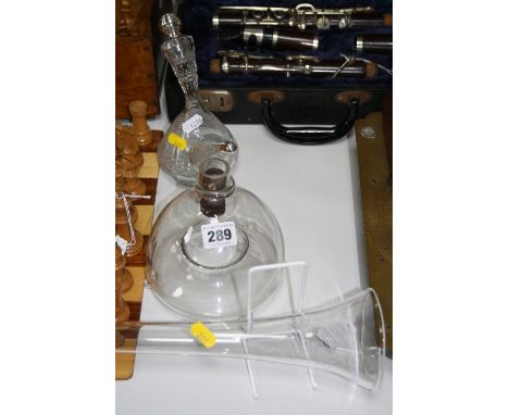 A GLASS FLY TRAP, a glass Spanish style Porron decanter and a glass yard of ale (3)