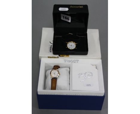 A BOXED TISSOT 150 YEAR OLD CELEBRATION WATCH, together with a Accurist watch