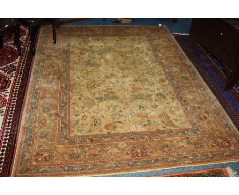 A CARAMEL GROUND HAND MADE CARPET, 100% wool, Royal Kesham Sennah label attached, approximate size 240cm x 170cm