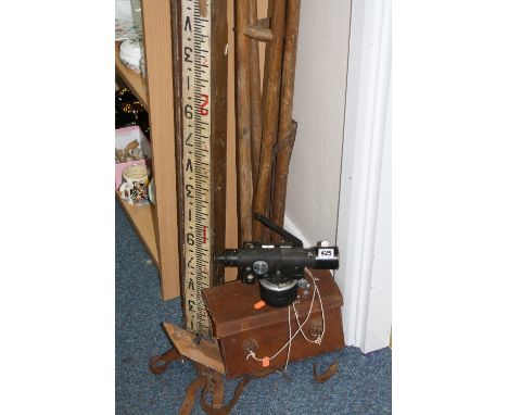 A HILGER AND WATTS DUMPY LEVEL, No 67433, carry case distressed, with tripod and measuring level
