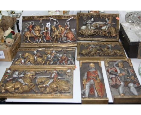 SEVEN MARCUS DESIGNS CERAMIC PLAQUES, 'Henry VIII', 'Robert Bruce', three depicting Knights jousting and two battle scenes