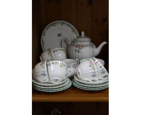 A ROYAL WORCESTER ENGLISH GARDEN PATTERN TWENTY TWO PIECE TEA SET