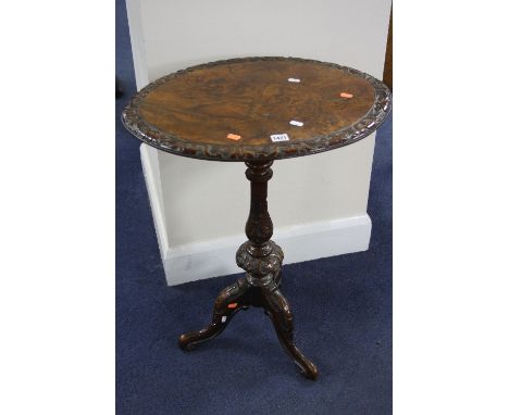 A VICTORIAN WALNUT OVAL TOPPED OCCASIONAL TABLE, on tripod base