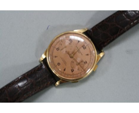 AN 18CT SWISS CHRONOGRAPH GENTS WRISTWATCH, on a leather strap