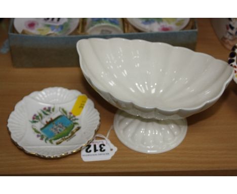A ROYAL WORCESTER SHELL SHAPED FOOTED BOWL, Blanc de Chine No.1252, Rd.No.84457, height approximately 10cm