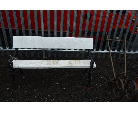 A PAINTED CAST IRON TREE BRANCH STYLE GARDEN BENCH, approximate size width 150cm