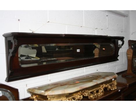 A LONG MAHOGANY WALL SHELF, with bevelled mirror, approximate size width 149cm x height 30cm