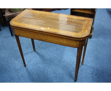 A 19TH CENTURY ROSEWOOD AND WALNUT CROSSBANDED FOLD OVER CARD TABLE, on square lapered legs (s.d., split top)