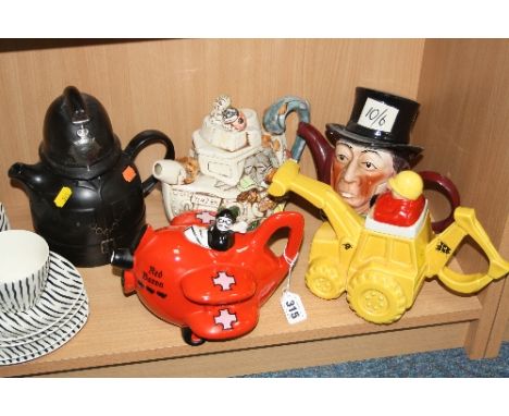 FIVE NOVELTY TEAPOTS, to include Carltonware 'JCB', 'Red Baron' (s.d. to Baron's scarf) and 'Policeman', a Tony Wood 'Mad Hat