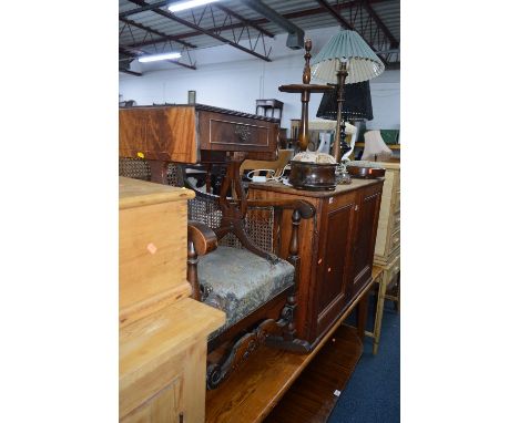 A MAHOGANY TWO DOOR CUPBOARD, a bergere rocking chair and a modern sofa table (sd) (3)