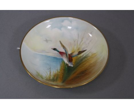 A MINTON TRINKET DISH, 'Mallard' signed R. Scott, diameter approximately 11cm