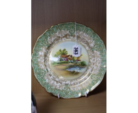 A ROYAL WORCESTER 'MAPLE' PLATE, signed Rushton, diameter approximately 22cm