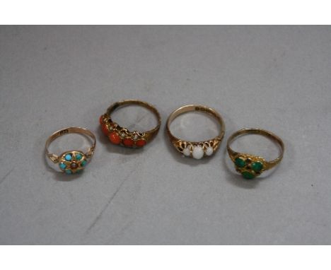 A COLLECTION OF FOUR GEM SET RINGS, to include a late Victorian coral and pearl half hoop ring, ring size L, hallmarked 9ct g