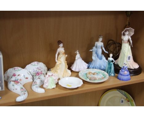 A GROUP OF CERAMICS, to include six Coalport and one Royal Doulton figurines, one converted to a lamp base, a pair of Royal W