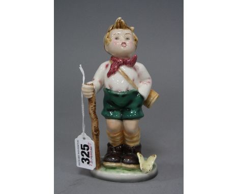 A GOLDSCHEIDER WIEN FIGURE, Karl boy gardener, impressed black backstamp, No.8835 and paper label (top of walking stick is da