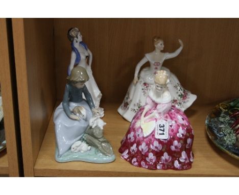 FOUR VARIOUS FIGURES, to include two Royal Doulton 'Victoria' HN2471, 'Shirley' HN2702, Coalport figure and a Nao figure (4)