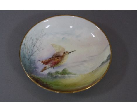 A MINTON TRINKET DISH, 'Woodcock' signed G. Wood, diameter approximately 11cm