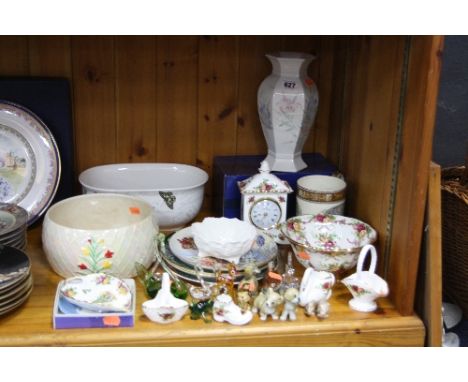 A COLLECTION OF GLASS AND CERAMIC ORNAMENTAL WARES, including Royal Albert Old Country Roses, Wade Whimsies, etc